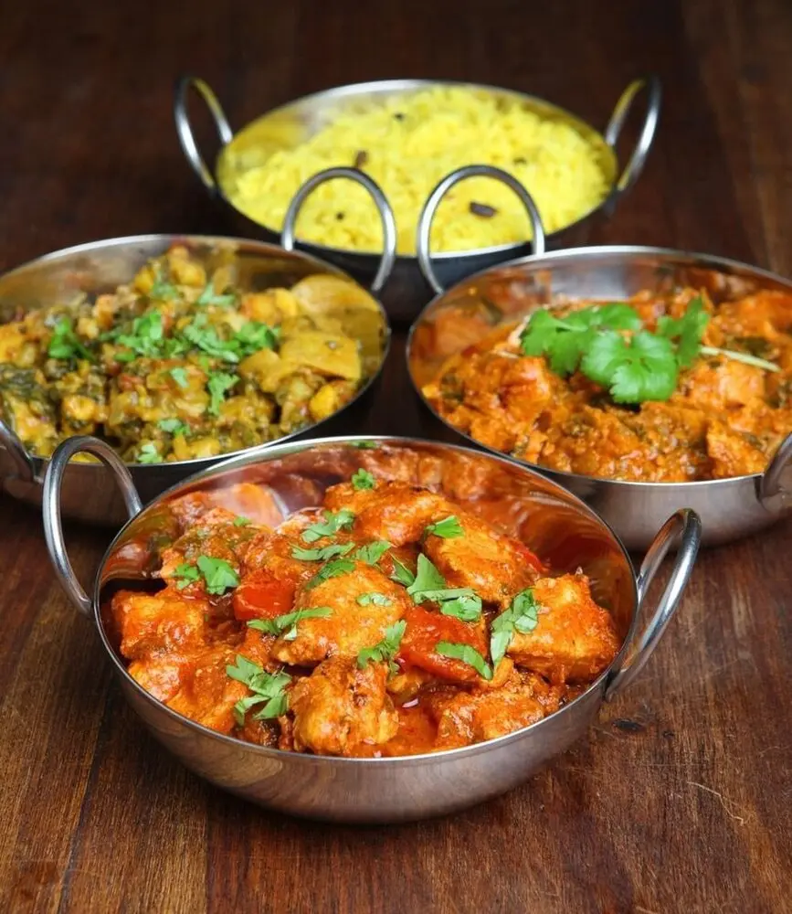 A selection of curries and pilau rice served by Cinnamon Arch